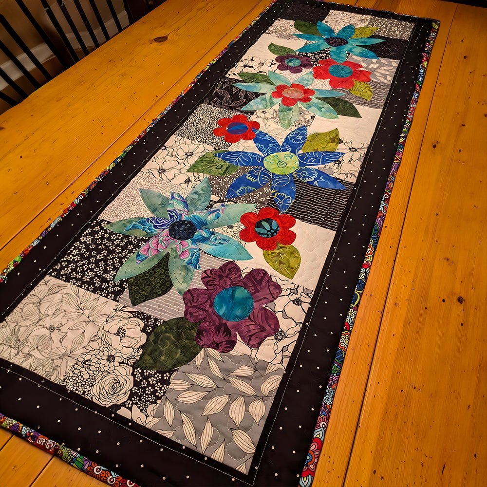 Scattered Patchwork Flowers with Black Border Table Runner