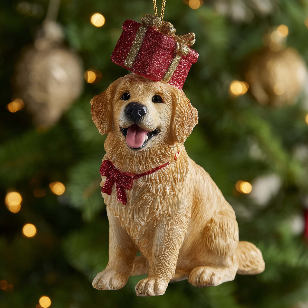 Golden Retriever Balancing a Gift Christmas Ornament