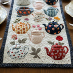 Teapots and Leaf Sprigs on Ivory Table Runner