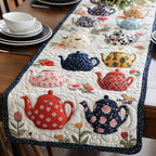 Red and Navy Teapots on Cream Table Runner