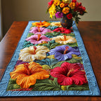 Row of Hibiscus on Blue Table Runner