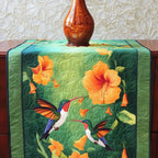 Hummingbirds with Orange Hibiscus on Green Table Runner