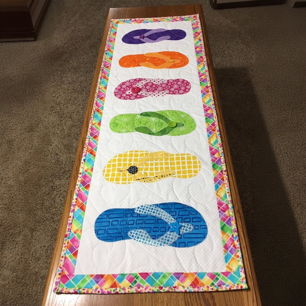 Pastel Flip Flops on Cream Table Runner