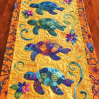Colorful Turtles on Yellow Table Runner
