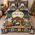A Child Is Born quilted 3-piece bedding set on a made bed with two matching pillow shams