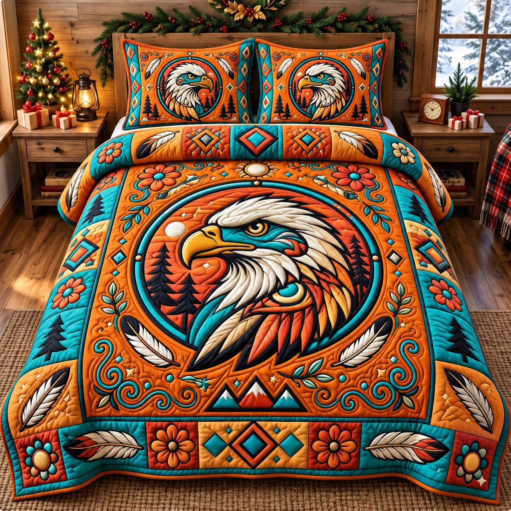 Amber Sun Eagle Spirit quilted 3-piece bedding set on a made bed in a warmly lit bedroom