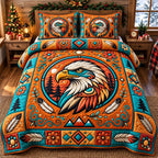 Amber Sun Eagle Spirit quilted 3-piece bedding set on a made bed in a warmly lit bedroom