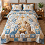 Angels of Bethlehem quilted 3-piece bedding set on a made bed in a softly lit bedroom