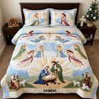 Angels of Christmas quilted 3-piece bedding set on a made bed in a winter-styled bedroom