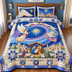 Angels Over Bethlehem quilted 3-piece bedding set on a made bed in a softly lit bedroom