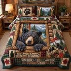 Black Bear Cabin quilted 3-piece bedding set on a made bed with two matching pillow shams