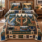 Blessed By The Wild Cross quilted 3-piece bedding set on a made bed in a softly lit bedroom
