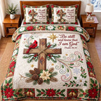 Blessed Faith Cardinal quilted 3-piece bedding set on a made bed in a softly lit bedroom