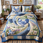 Blue Country Hen quilted 3-piece bedding set on a made bed in a farmhouse bedroom