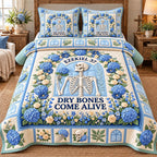 Blue Hydrangea Dry Bones Come Alive quilted 3-piece bedding set on a made bed against a dark styled interior