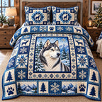 Blue Snowflake Husky quilted 3-piece bedding set on a made bed in a winter-styled bedroom