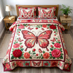 Butterfly Pink Roses quilted 3-piece bedding set on a made bed with two matching pillow shams