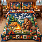 Campfire Night Bigfoot quilted 3-piece bedding set on a made bed with two matching pillow shams