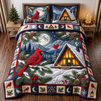 Cardinal Cabin quilted 3-piece bedding set on a made bed with two matching pillow shams