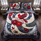 Cardinal Noel quilted 3-piece bedding set on a made bed in a winter-styled bedroom