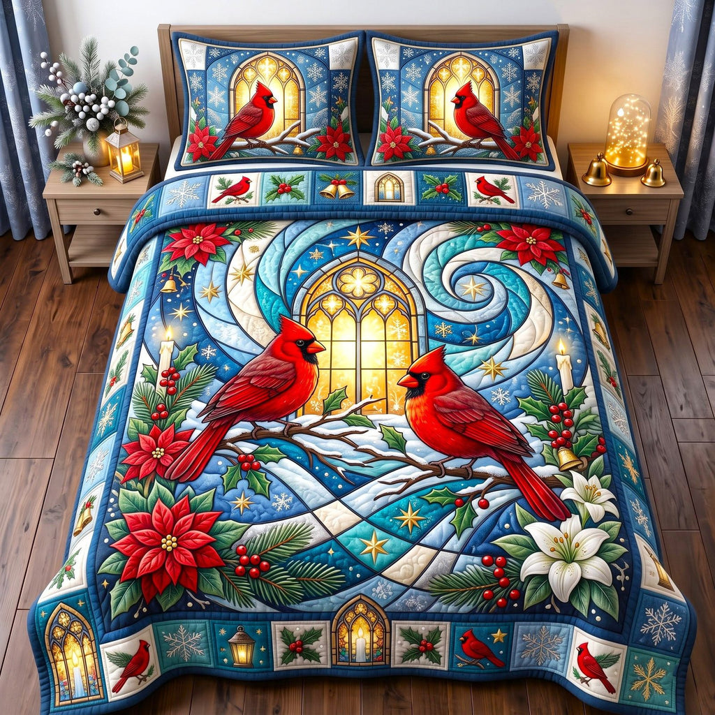 Cathedral Window Red Cardinal quilted 3-piece bedding set on a made bed with two matching pillow shams