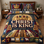 Christ Is King quilted 3-piece bedding set on a made bed in a softly lit bedroom