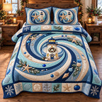 Coastal Winter Lighthouse quilted 3-piece bedding set on a made bed in a winter-styled bedroom