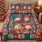 Colorful Snowman Friends quilted 3-piece bedding set on a made bed in a winter-styled bedroom