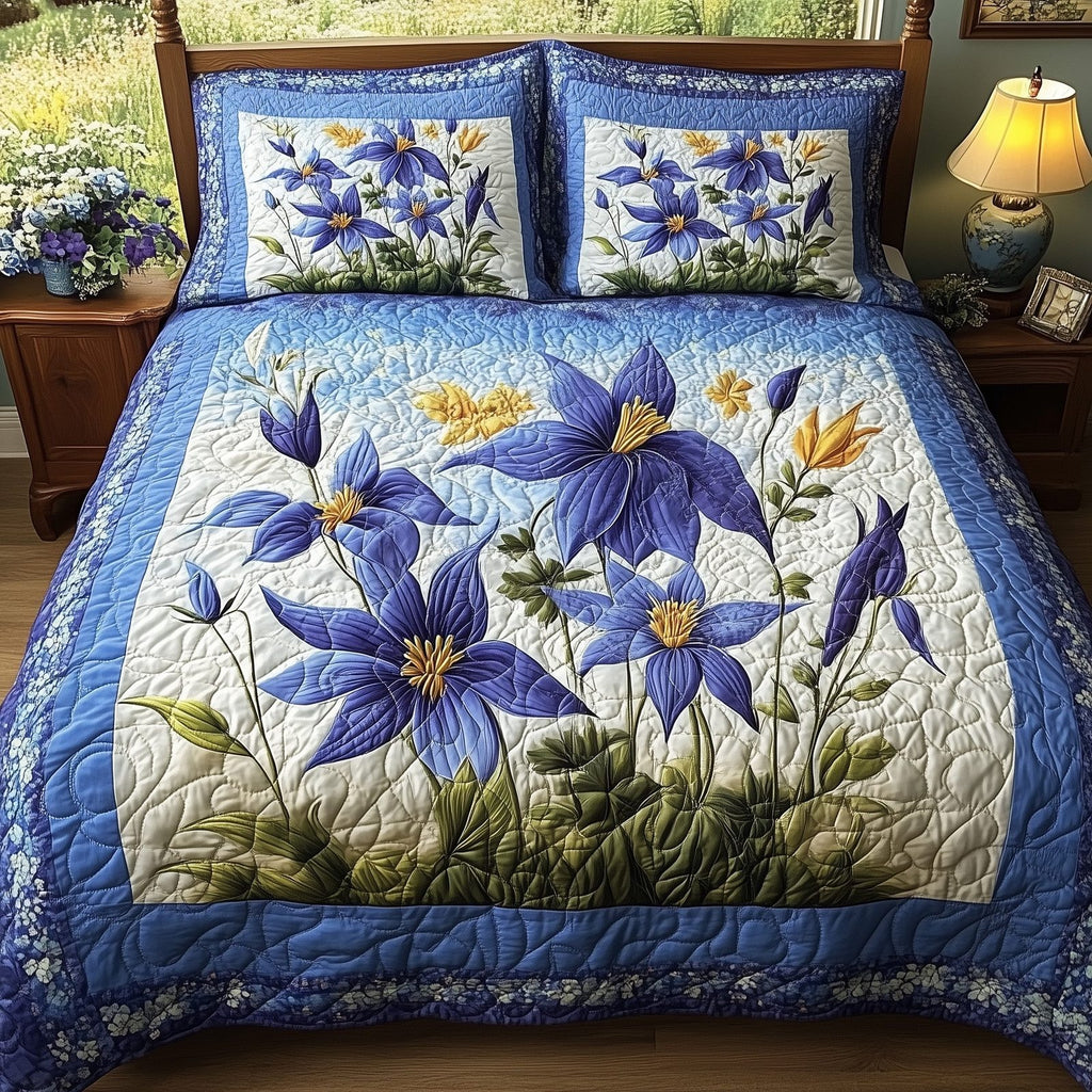 Columbine Charm 3-Piece Quilted Bedding Set GFTONL4284 quilted 3-piece bedding set on a made bed with two matching pillow shams