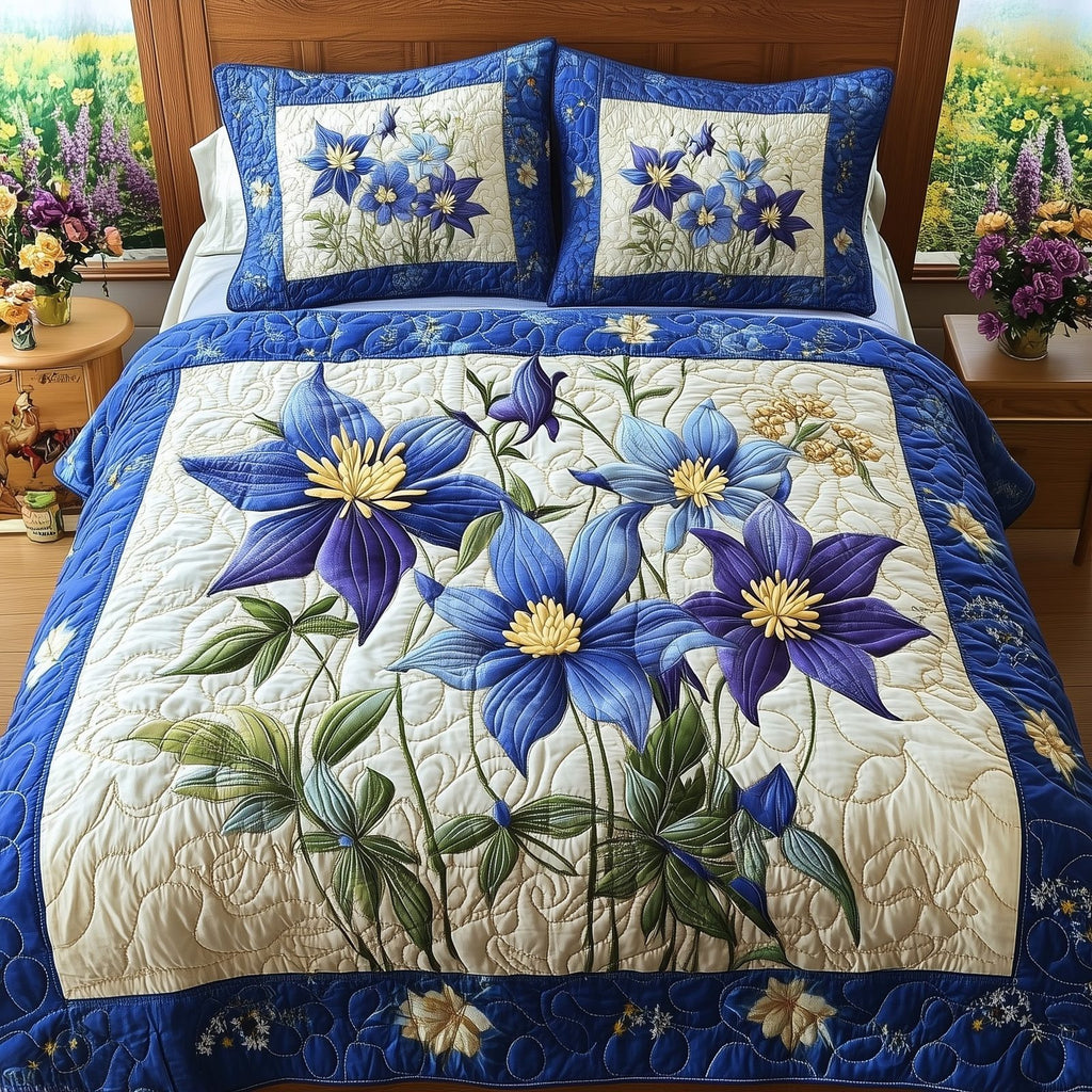 Columbine Charm 3-Piece Quilted Bedding Set GFTONL4287 quilted 3-piece bedding set on a made bed with two matching pillow shams