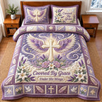 Covered Grace quilted 3-piece bedding set on a made bed with two matching pillow shams