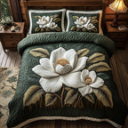 Delicate Magnolia Whisper 3-Piece Quilted Bedding Set GFTOHD4168 quilted 3-piece bedding set on a made bed with two matching pillow shams