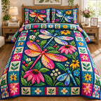 Dragonfly Meadow Glow quilted 3-piece bedding set on a made bed with two matching pillow shams