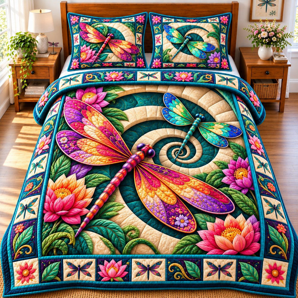 Dragonfly Summer Bliss quilted 3-piece bedding set on a made bed with two matching pillow shams