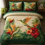 Emerald Hibiscus quilted 3-piece bedding set on a made bed with two matching pillow shams