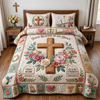 Faith Blooms In His Grace quilted 3-piece bedding set on a made bed in a softly lit bedroom
