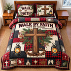 Faith Cross quilted 3-piece bedding set on a made bed in a softly lit bedroom