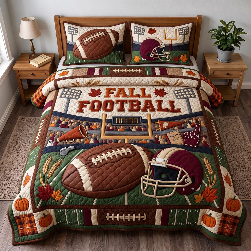 Fall Football quilted 3-piece bedding set on a made bed with two matching pillow shams