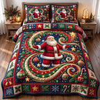 Fireside Nap Santa Claus quilted 3-piece bedding set on a made bed in a winter-styled bedroom