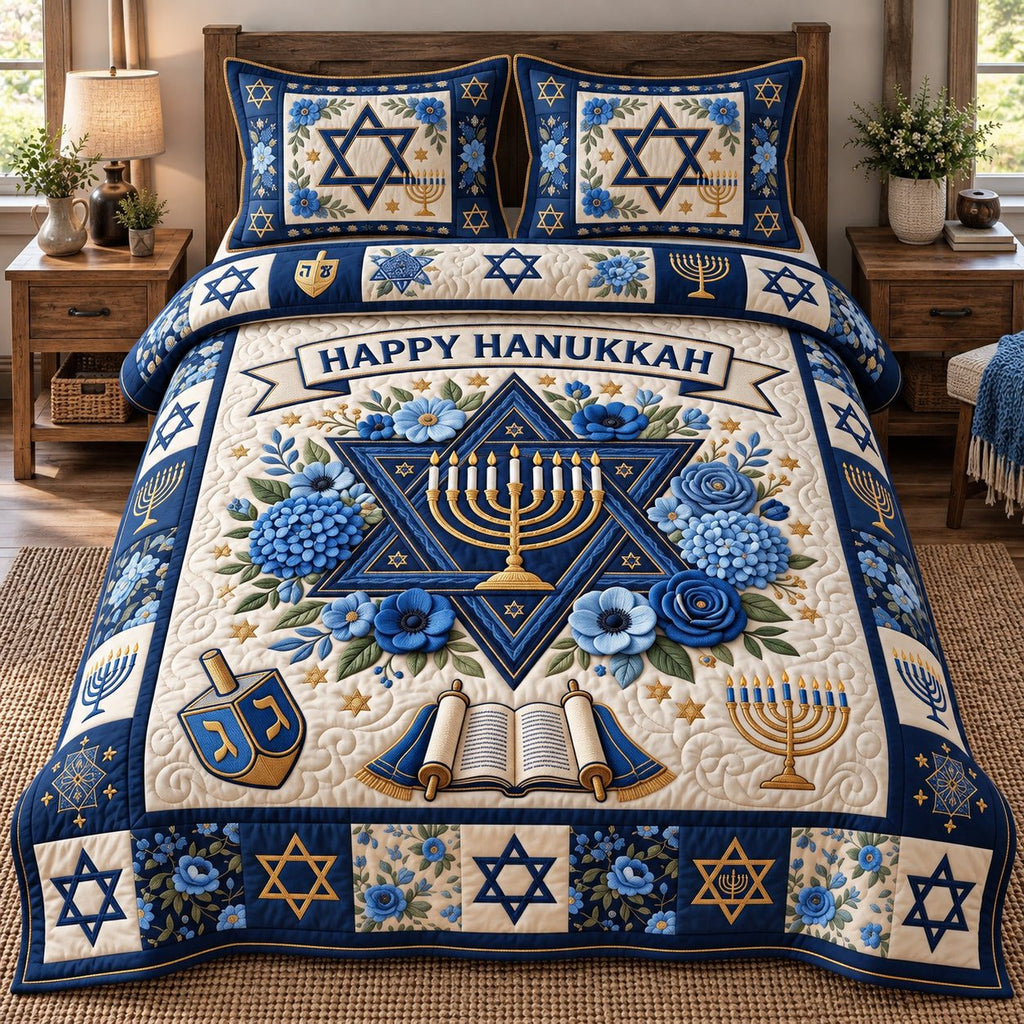 Floral Hanukkah Star quilted 3-piece bedding set on a made bed with two matching pillow shams