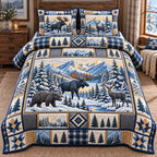Frosty Blue Moose Bear Patchwork quilted 3-piece bedding set on a made bed in a winter-styled bedroom