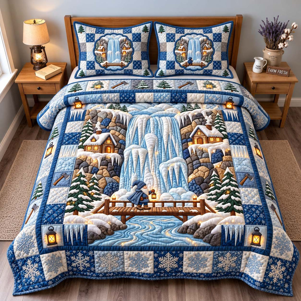 Frozen Falls Village quilted 3-piece bedding set on a made bed with two matching pillow shams