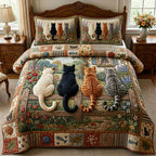 Garden Fence Cats quilted 3-piece bedding set on a made bed with two matching pillow shams