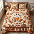 Ghost Patchwork Happy Halloween quilted 3-piece bedding set on a made bed against a dark styled interior