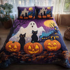 Ghostly Giggles Cats Pumpkins quilted 3-piece bedding set on a made bed against a dark styled interior