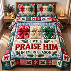Gift Boxes Praise Him Christmas quilted 3-piece bedding set on a made bed in a winter-styled bedroom