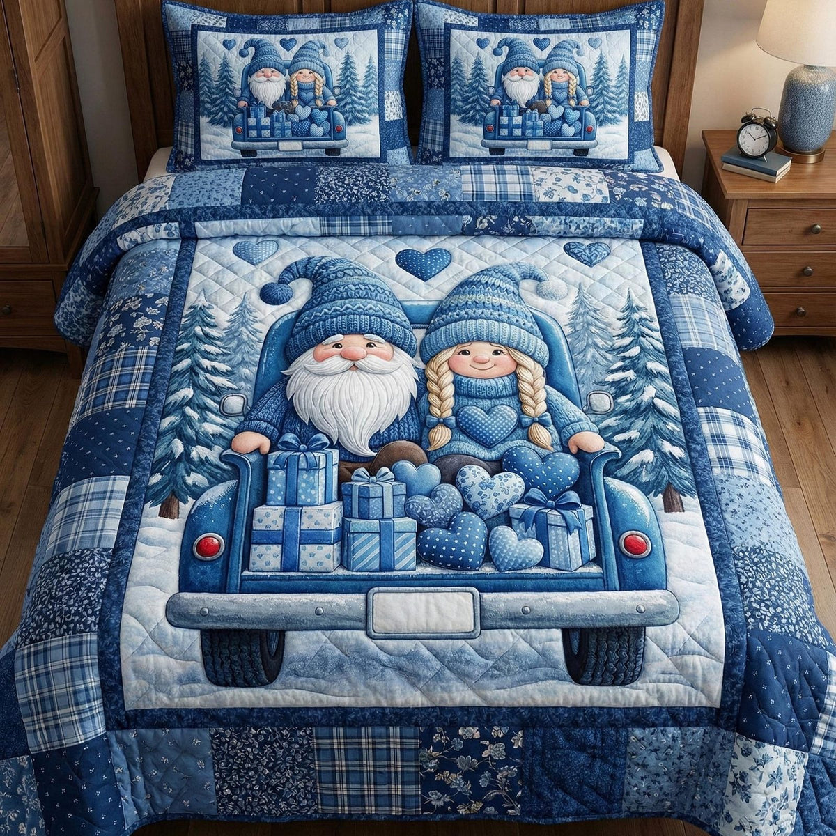 Gnome Sweethearts Blue Truck quilted 3-piece bedding set on a made bed with two matching pillow shams