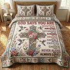 God Says Rose Cross Bloom quilted 3-piece bedding set on a made bed in a softly lit bedroom