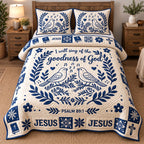 Goodness Of God quilted 3-piece bedding set on a made bed in a softly lit bedroom