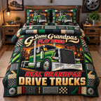 Grandpas Drive Trucks quilted 3-piece bedding set on a made bed with two matching pillow shams